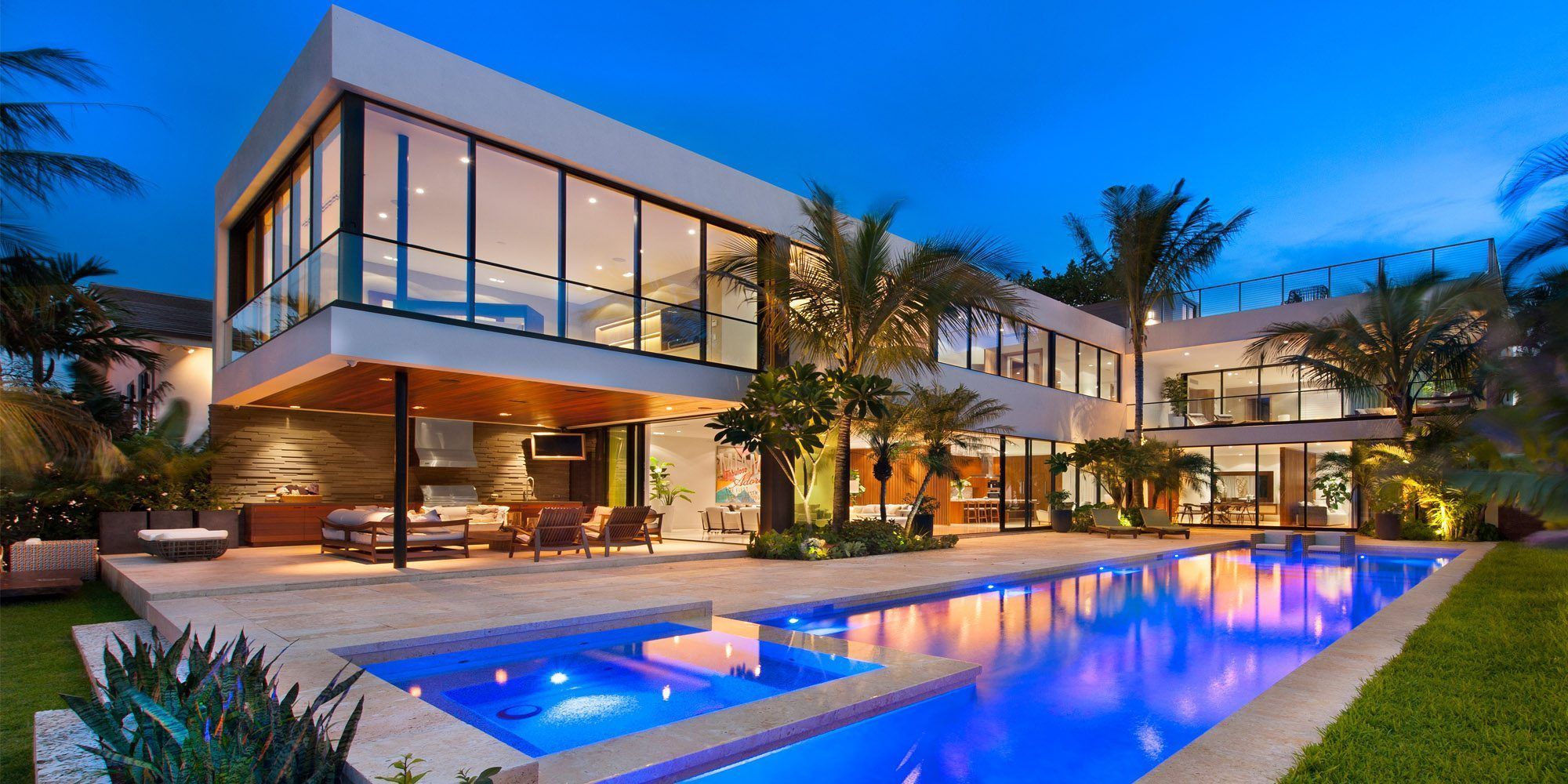 Luxury modern home with pool showing comprehensive property protection
